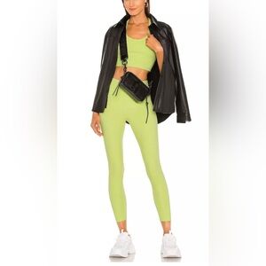 Koral High Rise Black Out Leggings in Citrina Green size Small